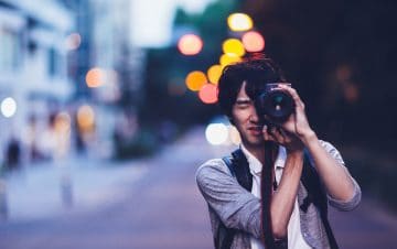 man taking photos