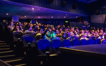 group sat in cinema
